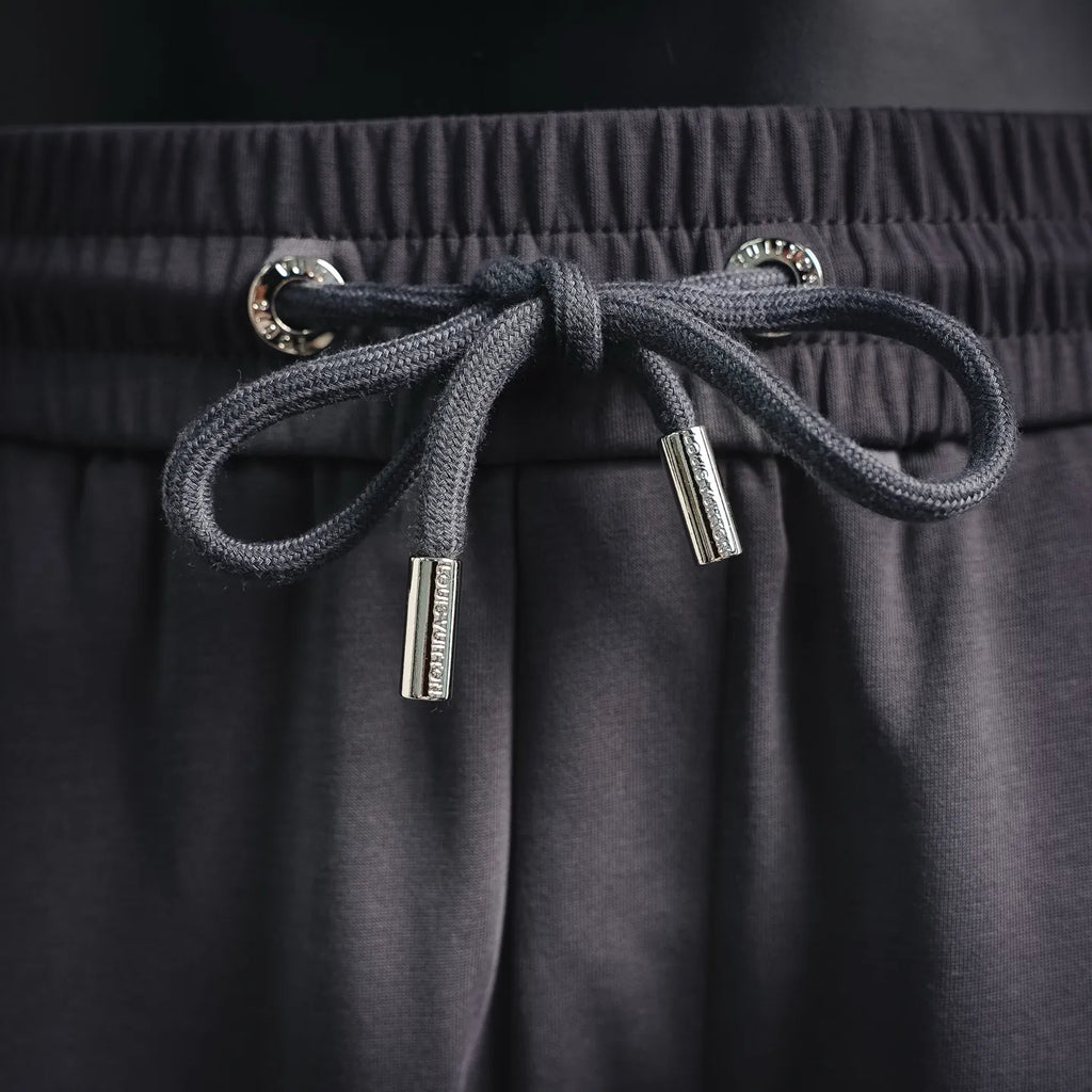 LV men's jogger pants drawstring with metal aglets, dark gray