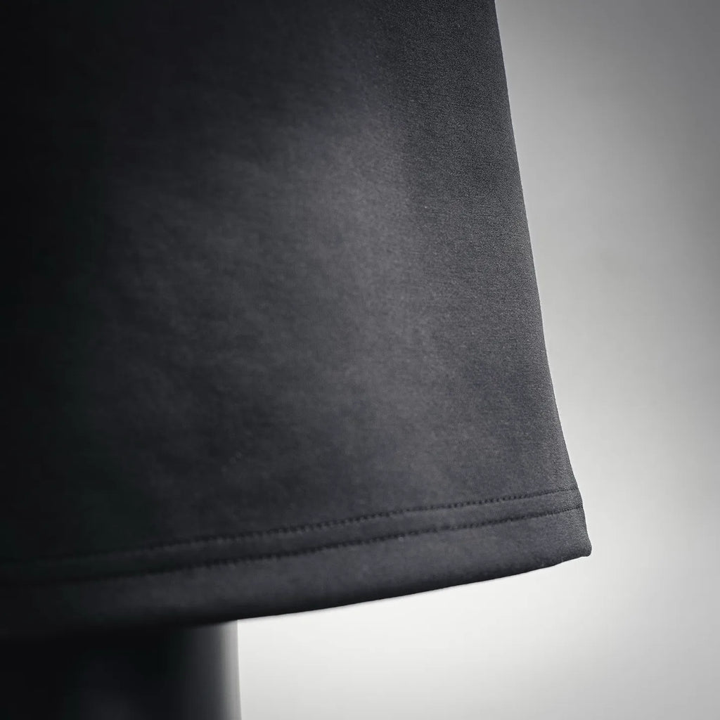 Black knit shorts hem with clean stitched cuff