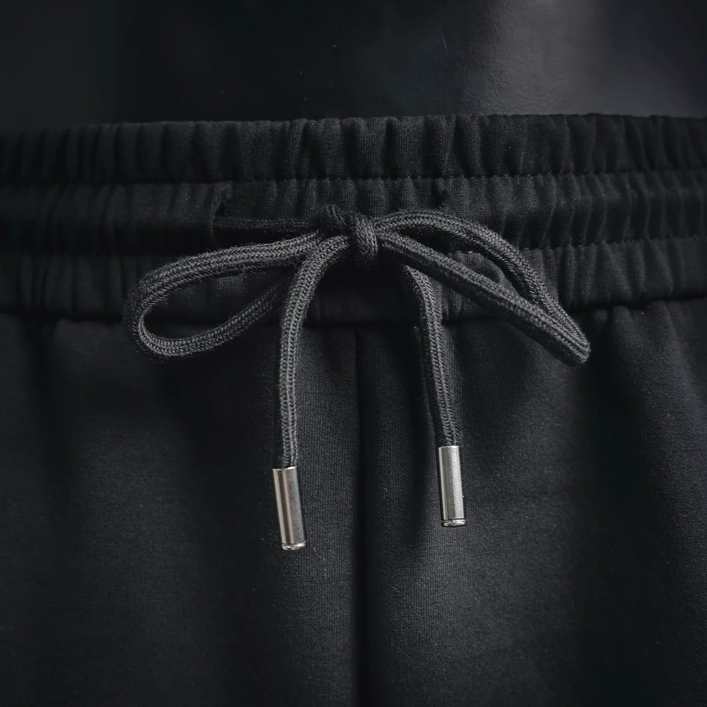 Black shorts drawstring with metal tips and elastic waistband
