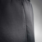 Black knit shorts with side seam and curved stitch line