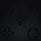 Black fabric close-up with repeating star motifs