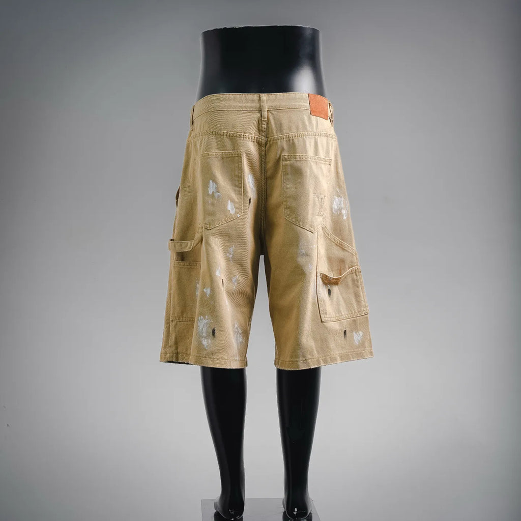 Beige LV utility shorts with back pockets and waistband tab
