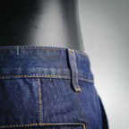LV dark blue denim shorts side seam and pocket close-up with yellow stitching