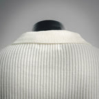 Off-white knit polo collar and ribbed knit texture detail