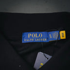 Polo Ralph Lauren size tag inside dark navy polo shirt, marked XL TG 5