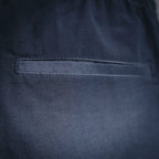 Navy Prada pants with side pocket and stitched hem detail