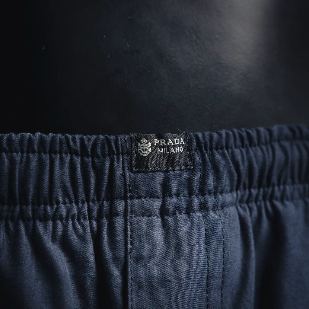 Prada Milano logo patch on navy elastic waistband