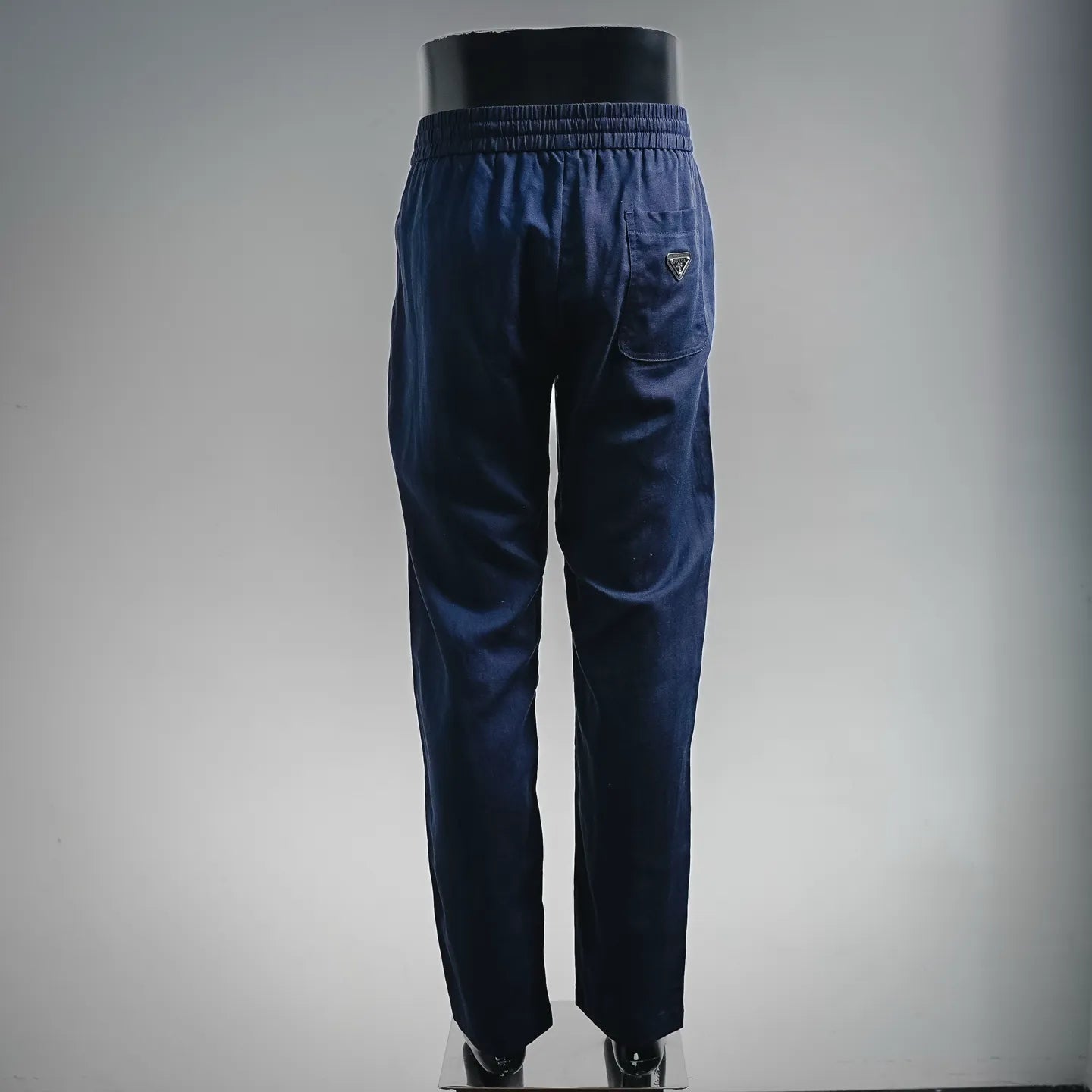 Prada pants, dark blue jogger-style with elastic waist and single back pocket