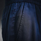 Prada pants waist and pleat detail, dark blue woven fabric with seam lines