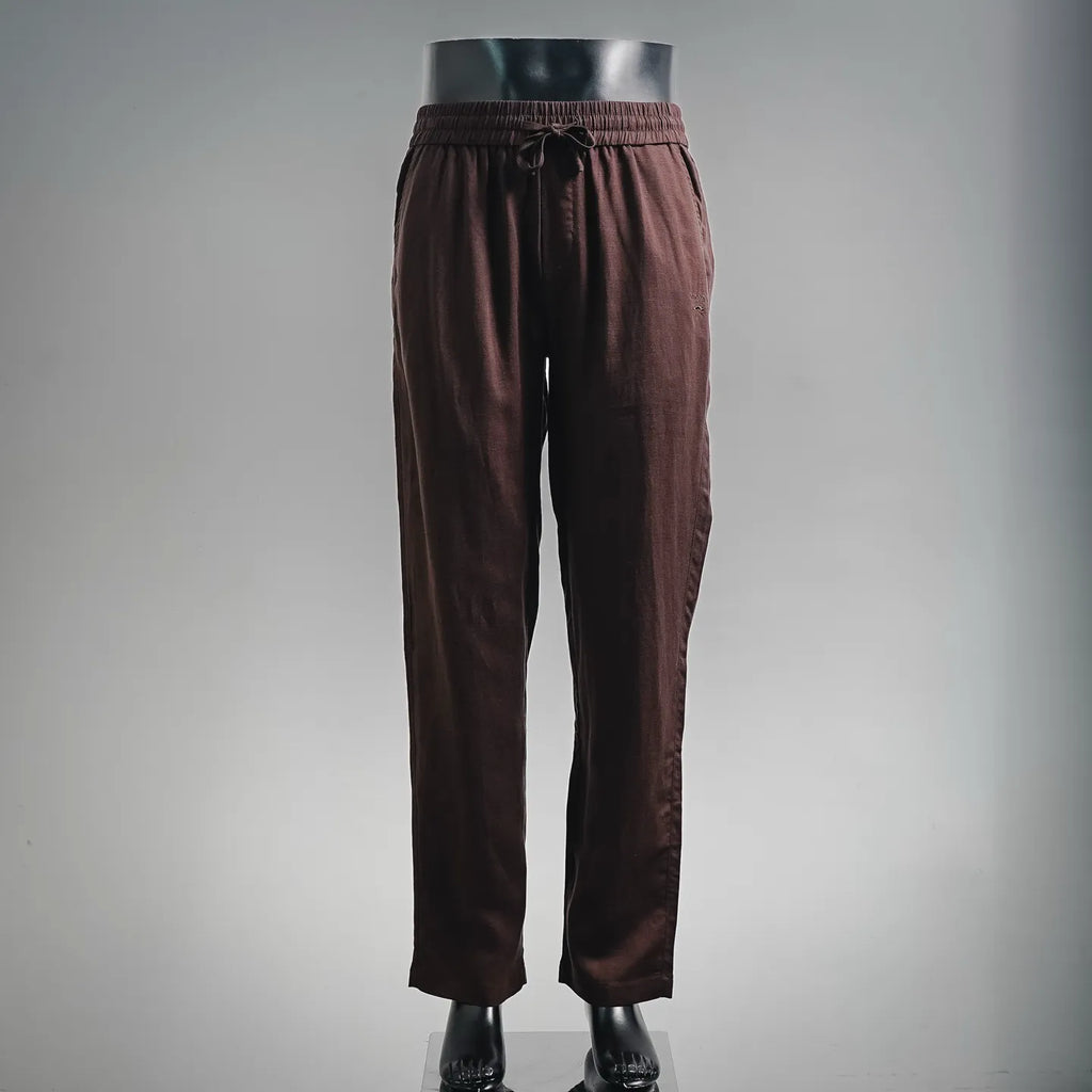 Prada pants in dark burgundy with elastic waistband and drawstring, tapered legs