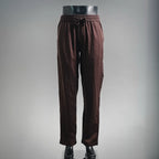 Prada pants in dark burgundy with elastic waistband and drawstring, tapered legs