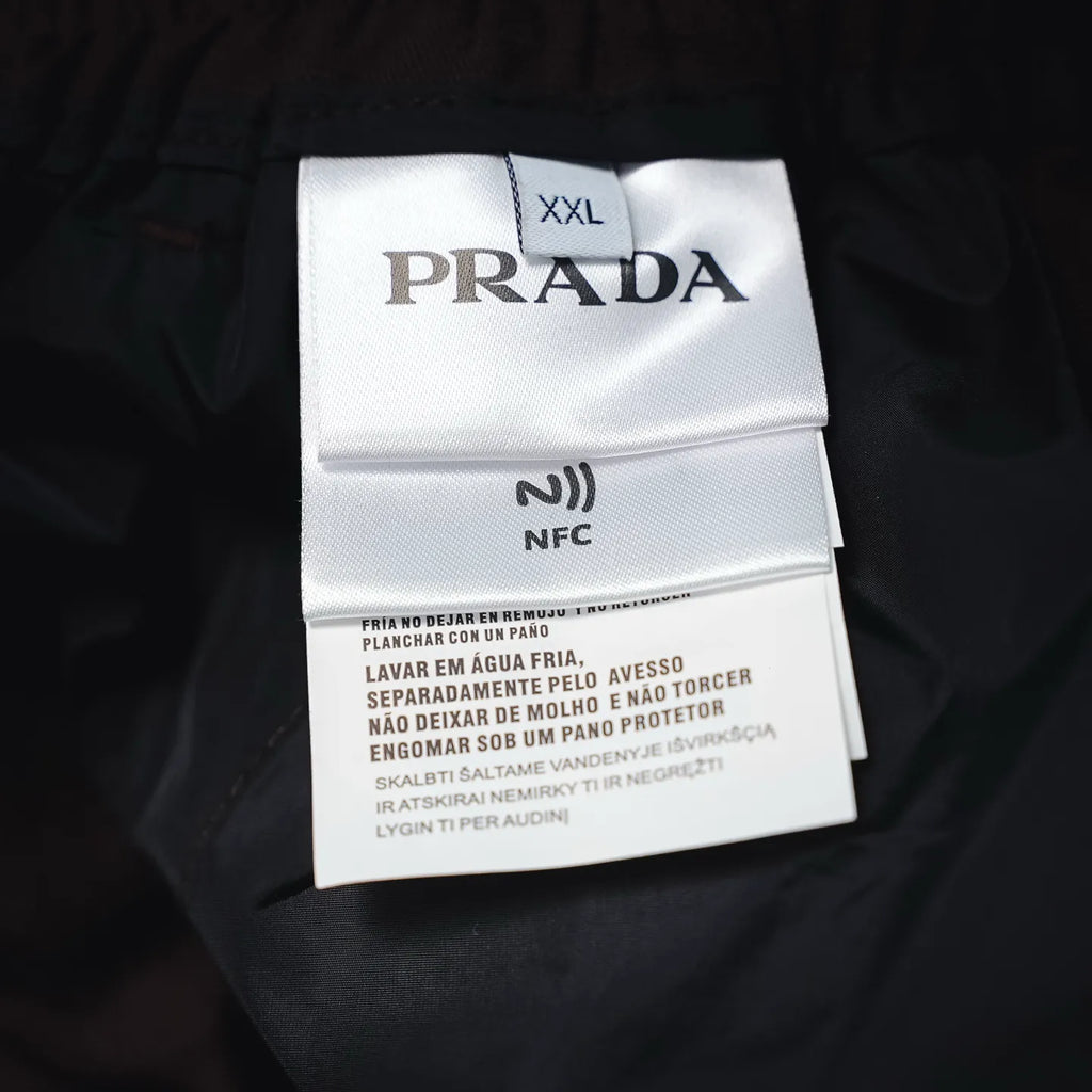 Prada pants size XXl care label on fabric, dark burgundy