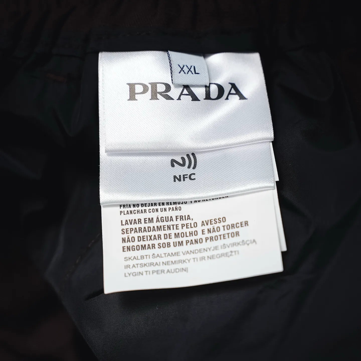 Prada pants size XXl care label on fabric, dark burgundy