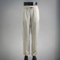 Light beige drawstring pants with elastic waist and side pockets