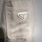 Light beige pants back patch pocket with Prada triangular logo patch