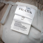 Light beige pants with PRADA care and size label showing XXL and NFC