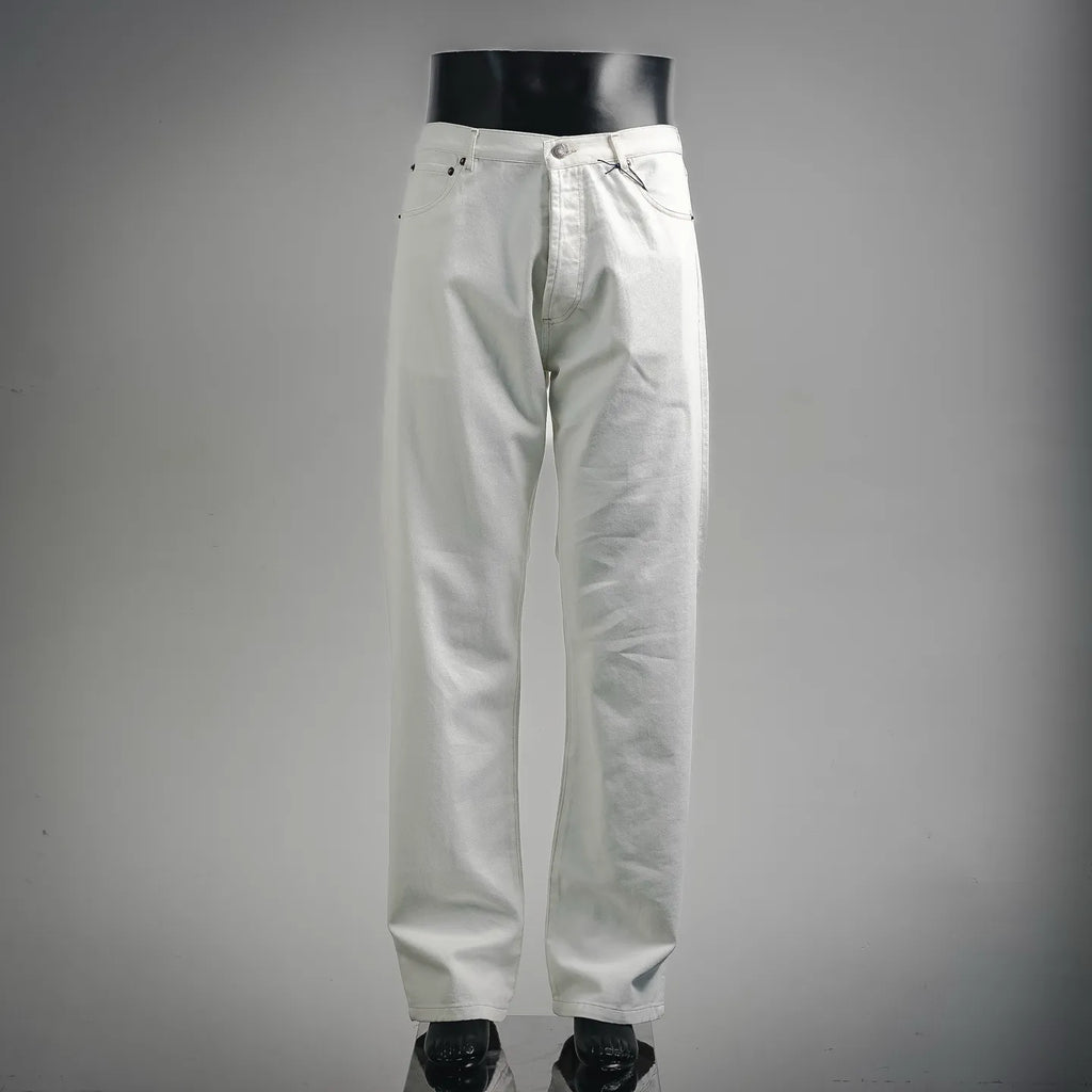 White Prada pants with button-fly, belt loops, and stitched side pockets.