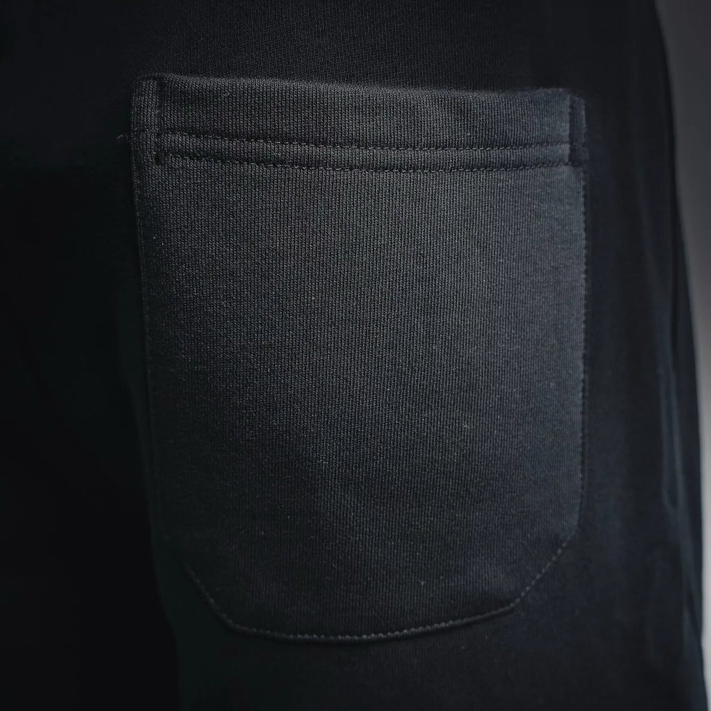 Black side pocket with stitched edge on knee-length shorts