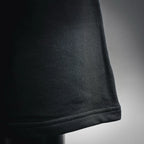 Straight hem with ribbed trim on black shorts