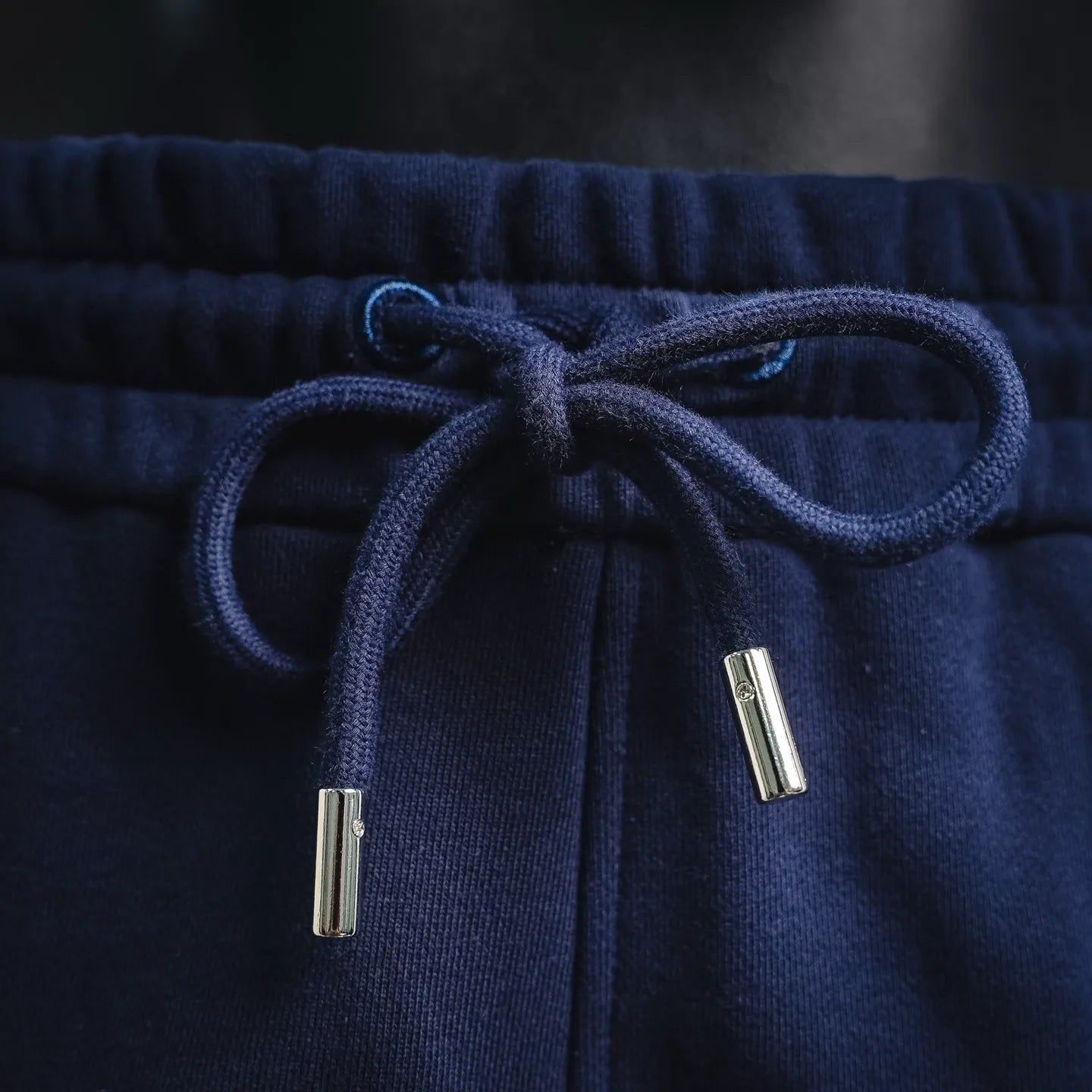 Prada blue drawstring shorts with round blue cord and silver tips