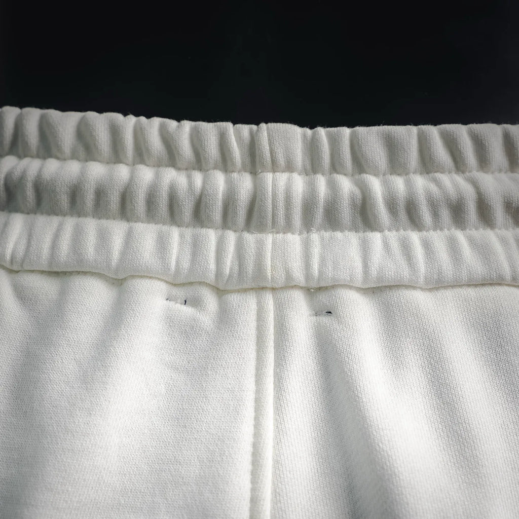 White shorts waistband with drawstring channel and stitched hem