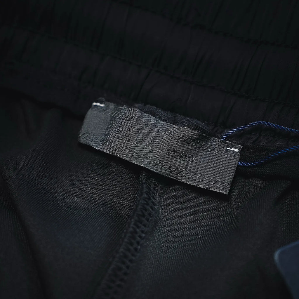 Prada black pants inner care label on waistband