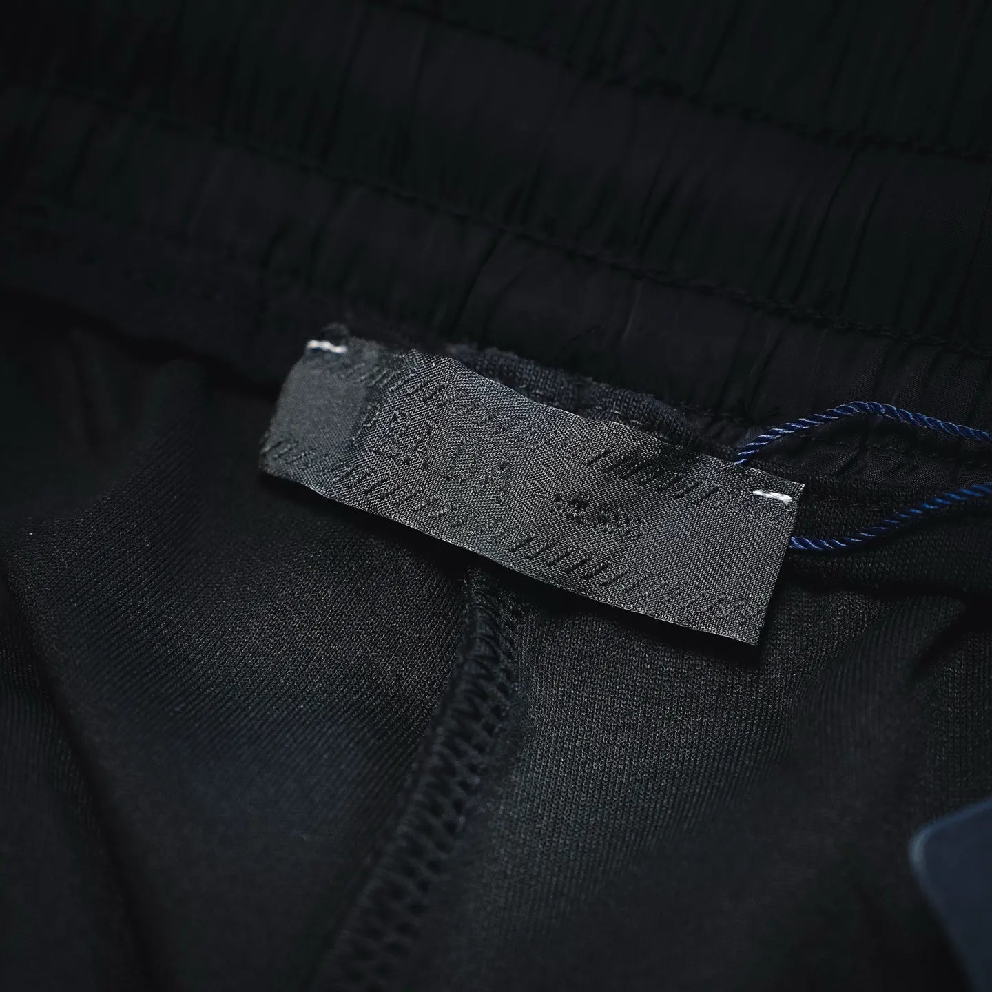 Prada black pants inner care label on waistband