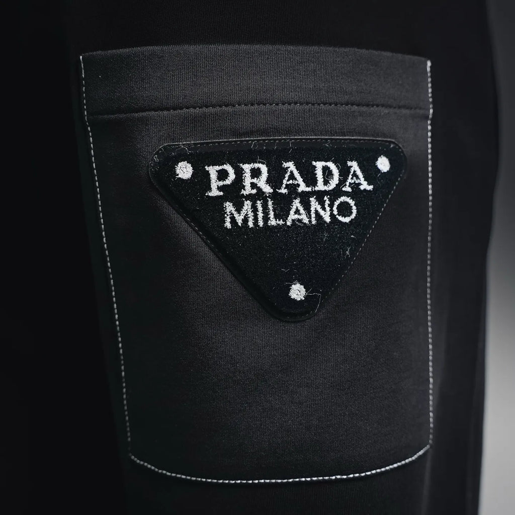 Prada black pants back pocket with PRADA MILANO logo patch