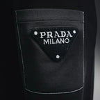 Prada black pants back pocket with PRADA MILANO logo patch
