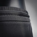 Prada black pants waistband seam and stitching detail