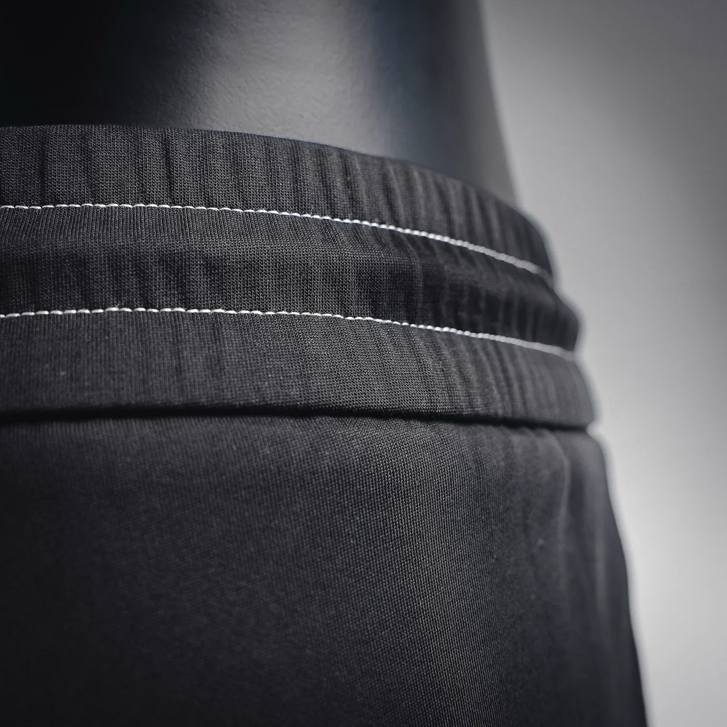 Prada black pants waistband seam and stitching detail