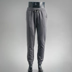 Dark gray drawstring jogger pants with elastic cuffs