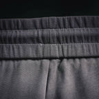 Dark gray drawstring waistband with center seam detail