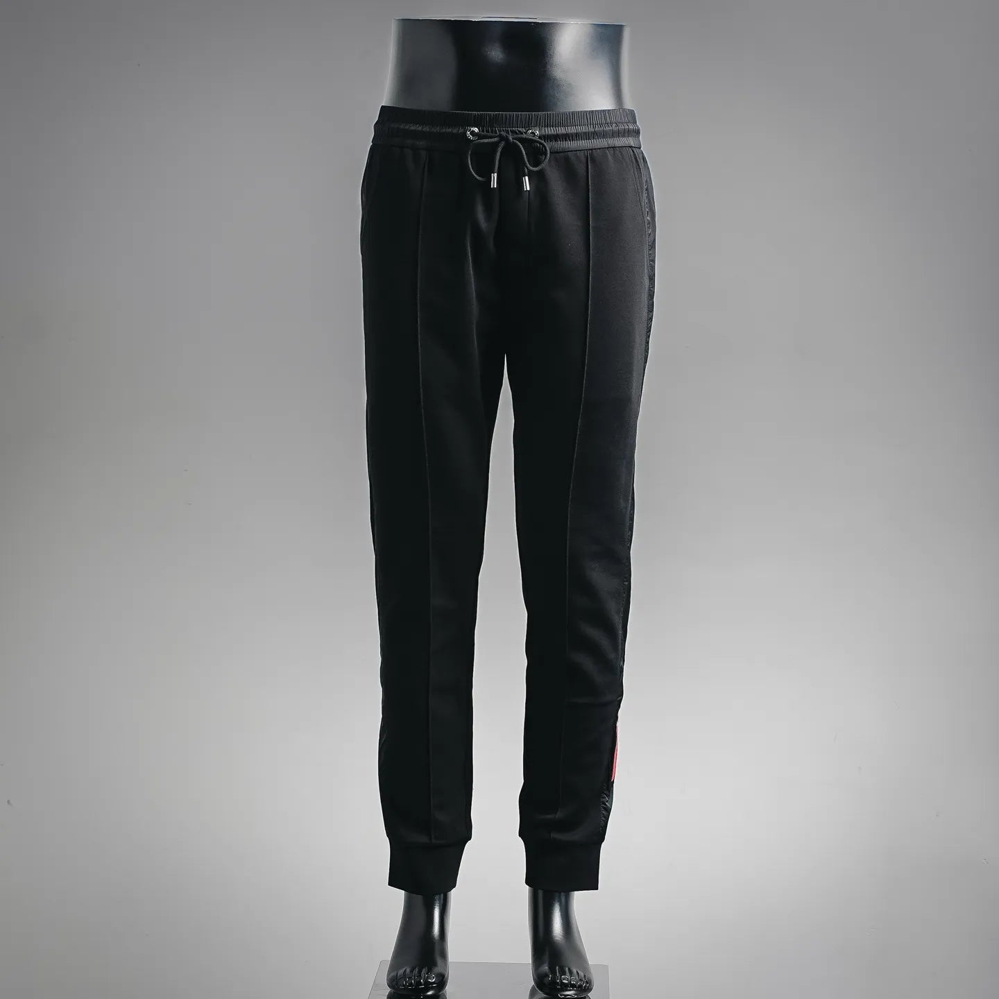 Prada black pants with drawstring waist and tapered cuffed hems