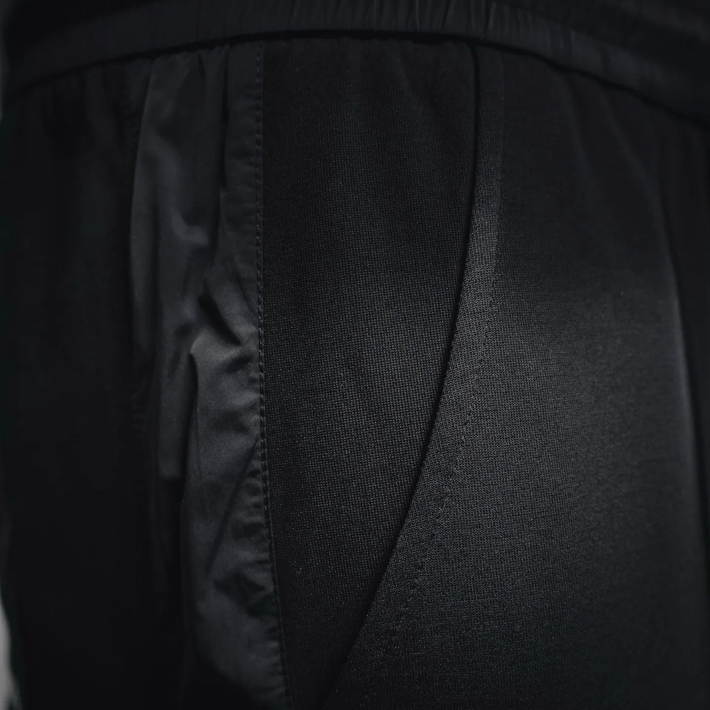Prada black pants close-up of side panel and pocket seam