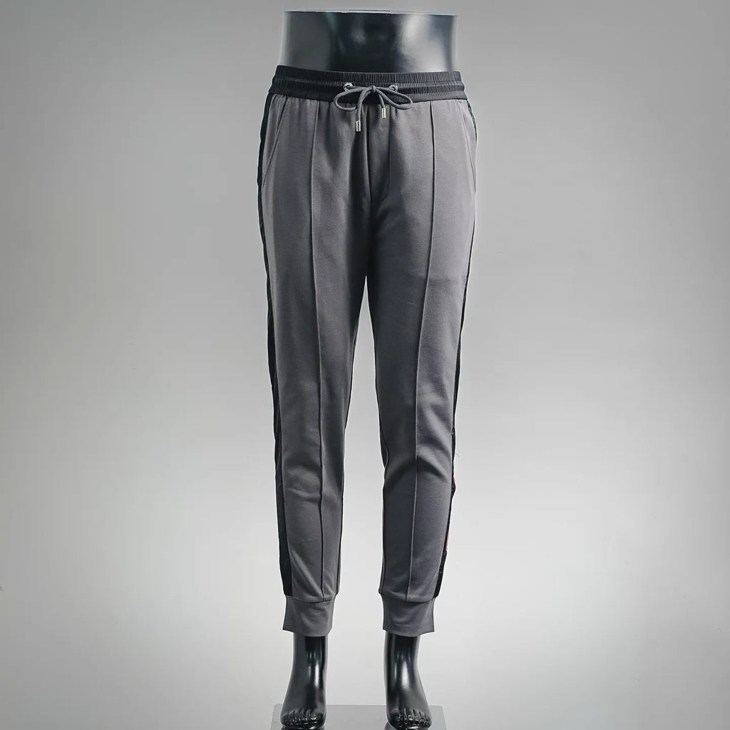 Prada dark gray drawstring pants with elastic waistband and tapered jogger legs