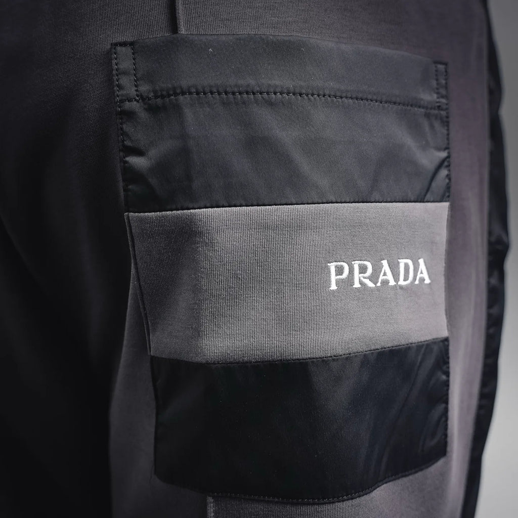 Prada dark gray pants with back pocket and PRADA logo patch