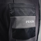 Prada dark gray pants with back pocket and PRADA logo patch