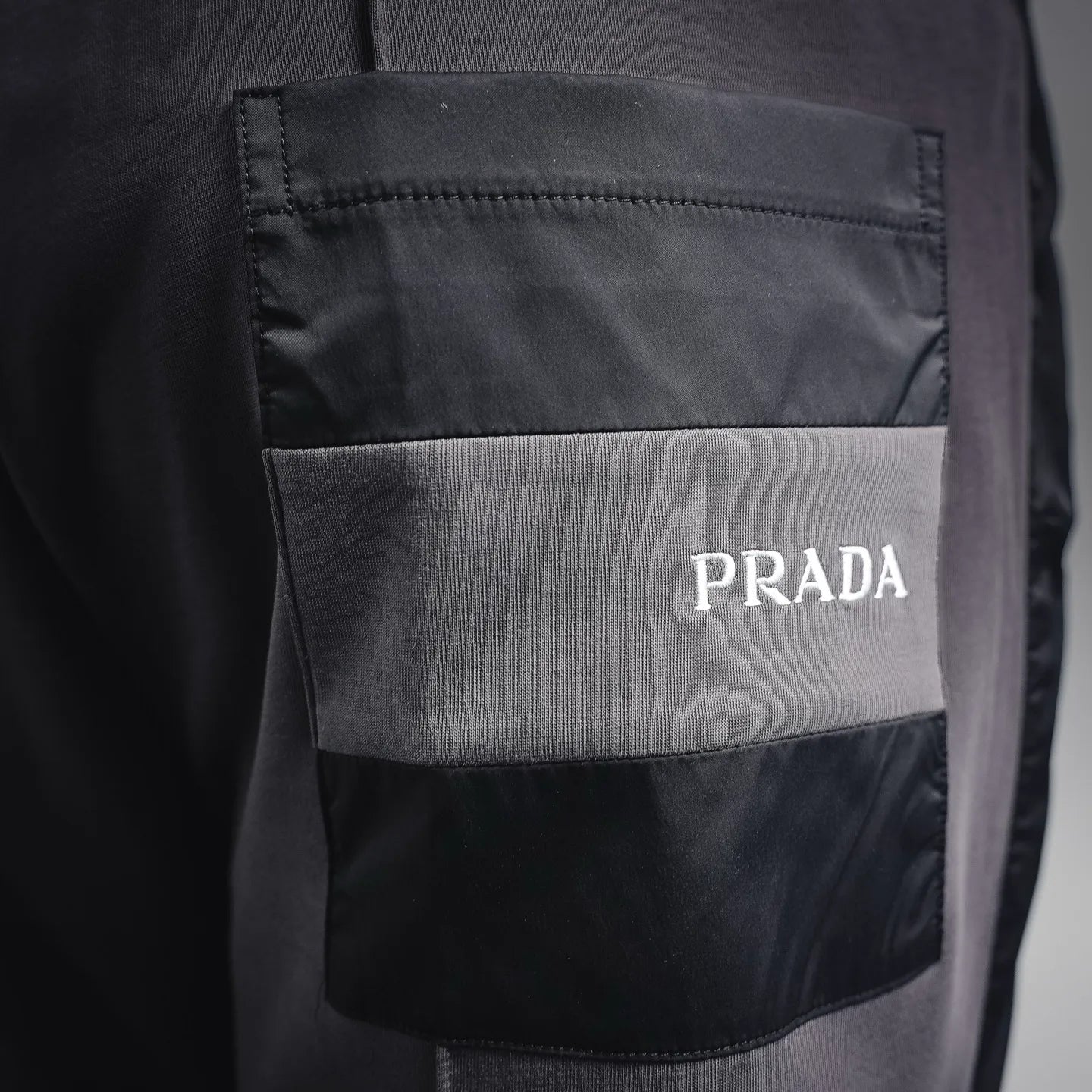 Prada dark gray pants with back pocket and PRADA logo patch