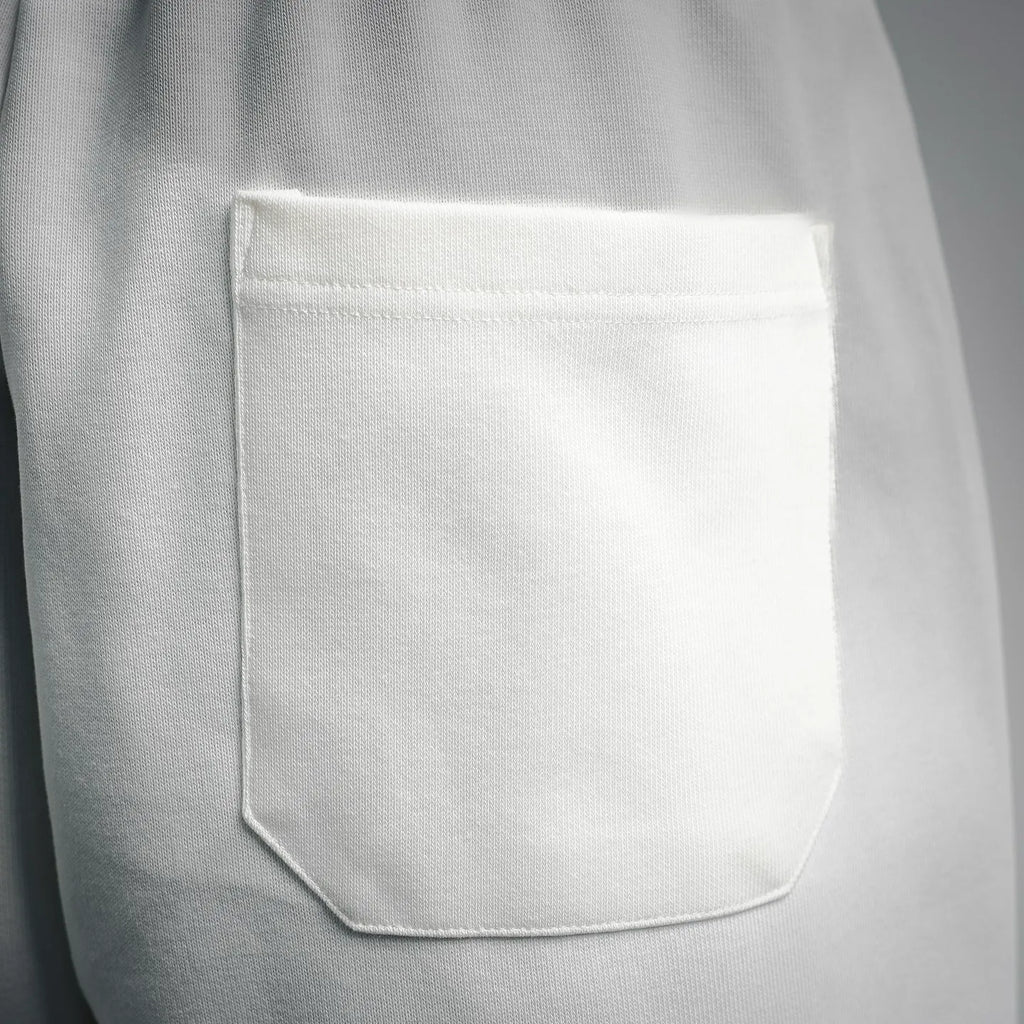 White Prada shorts front pocket with stitched opening detail.