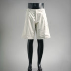 White tailored shorts with belt loops and button closure
