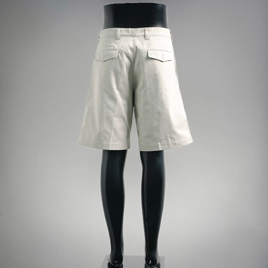 White tailored shorts, rear view with pockets and belt loops