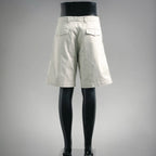 White tailored shorts, rear view with pockets and belt loops