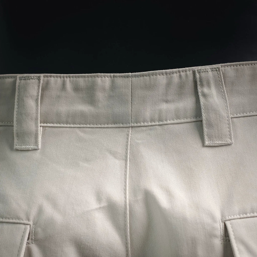 White shorts waistband with belt loops and stitched front closure