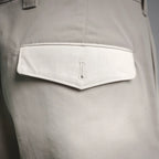 White shorts back pocket with small embroidered brand tag