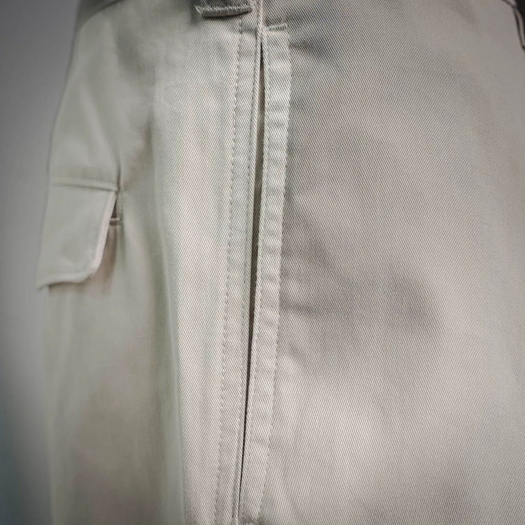 White shorts front with zip fly and vertical seam detail