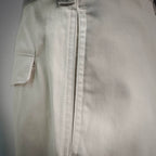 White shorts front with zip fly and vertical seam detail