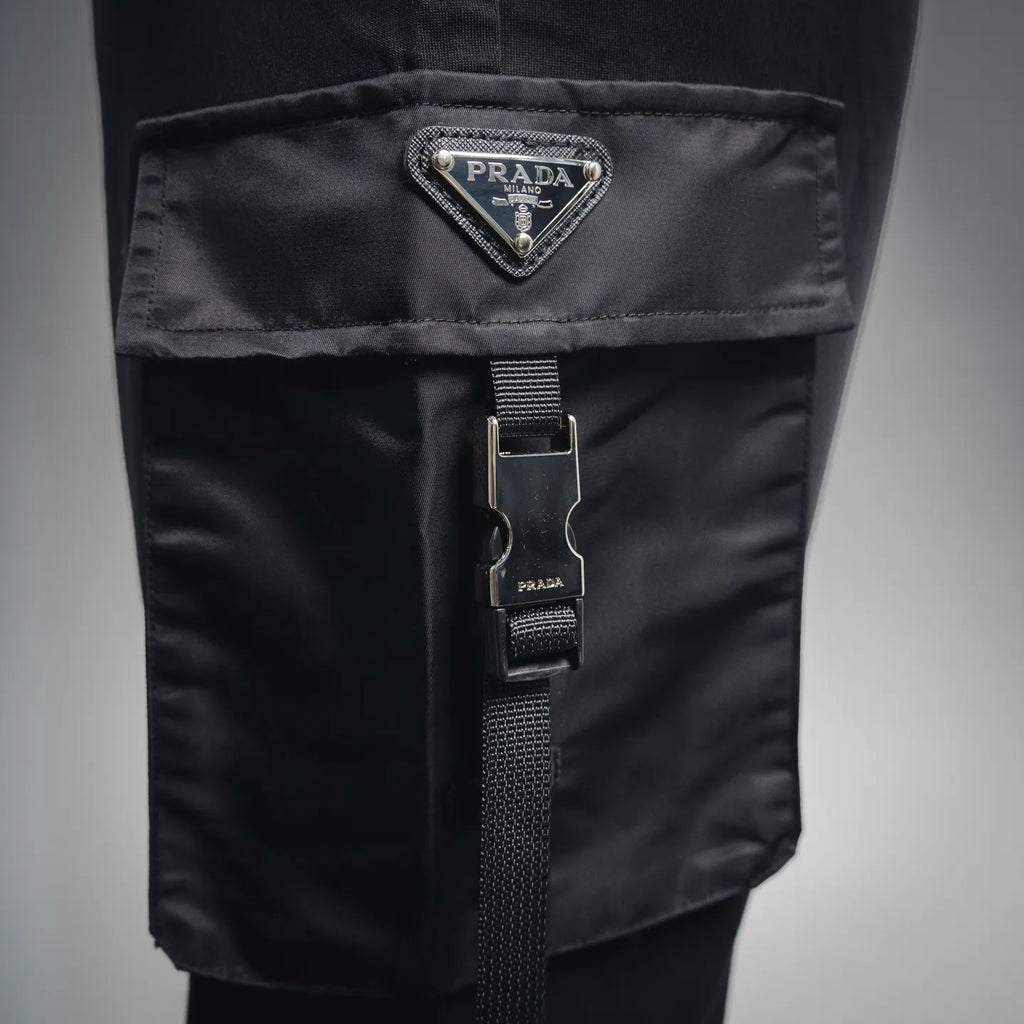 Black Prada side cargo pocket with woven strap and metal hardware