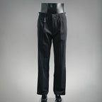 Black tailored pants with belt loops and front pleats