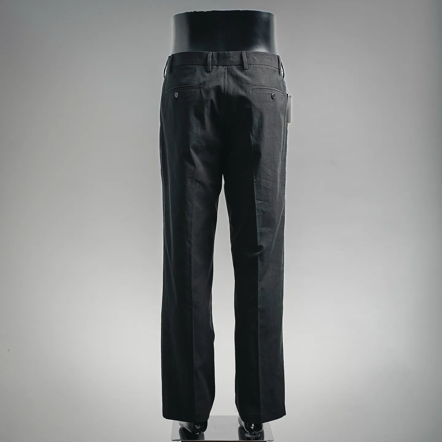 Black tailored pants back view with belt loops and stitched yoke